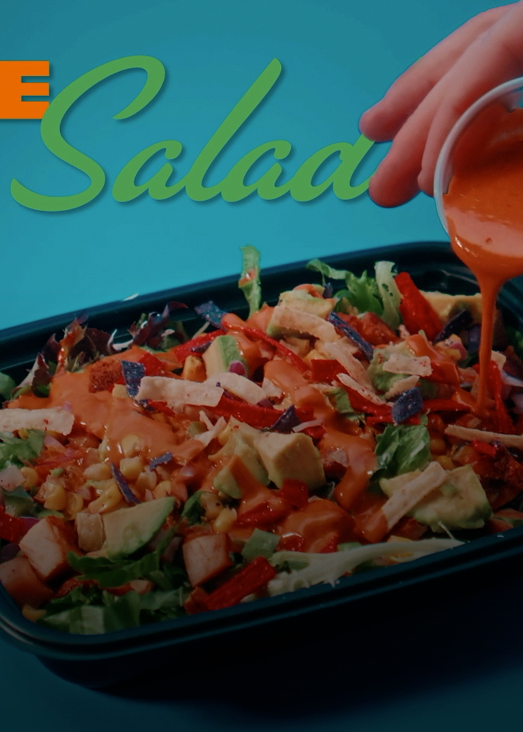 Freebirds Agave Adobo Salad campaign featuring salad, dressing, and fresh ingredients